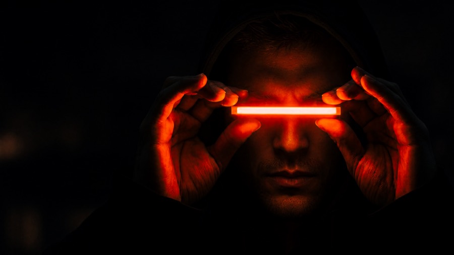 Hands holding a light bar at eye level